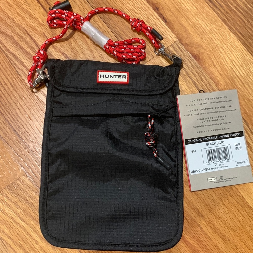 Still has tags. Hunter phone pouch